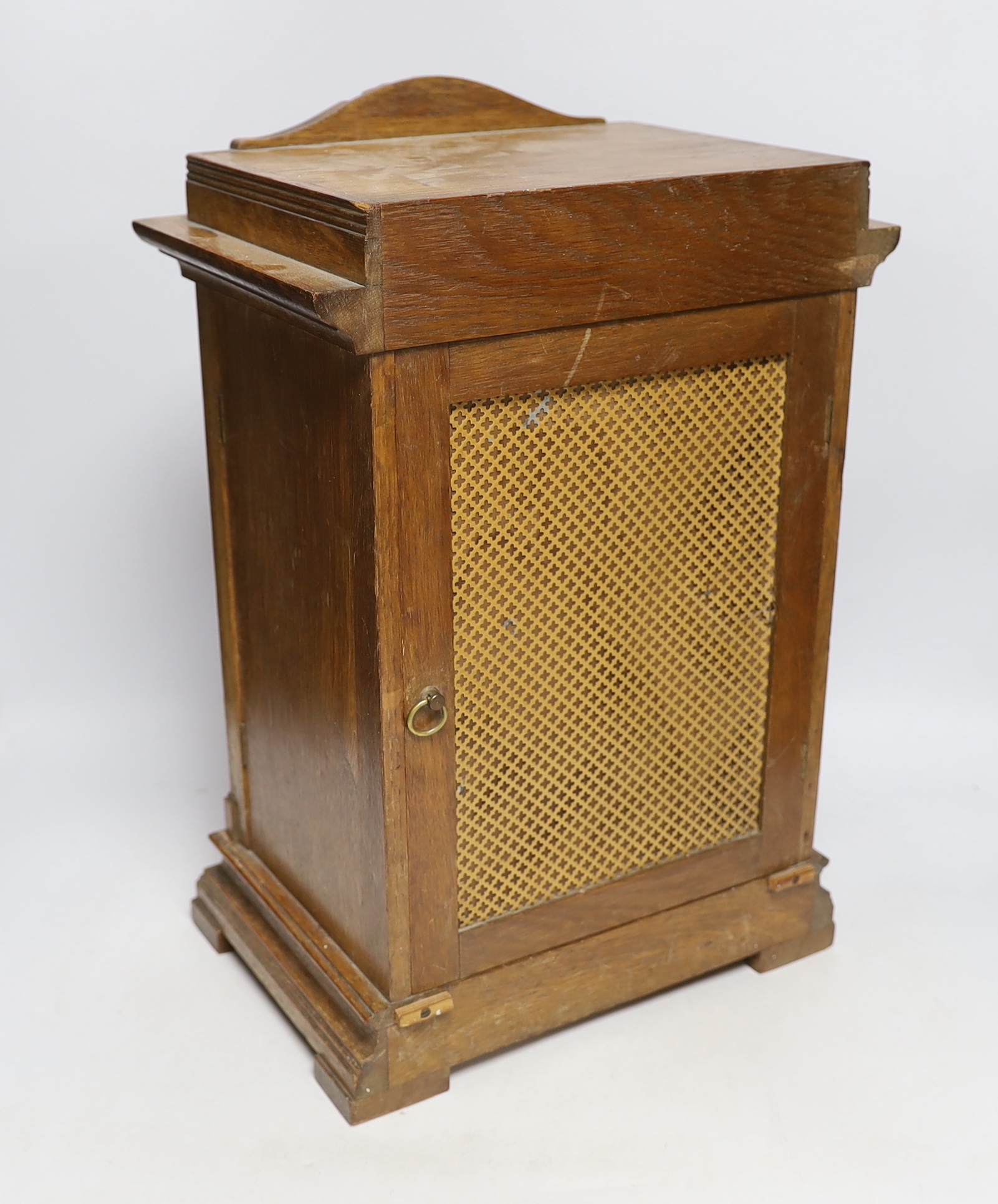 A 1920's Gustav Becker oak bracket clock with three train movement, striking and chiming on five gongs, 42.5cm high